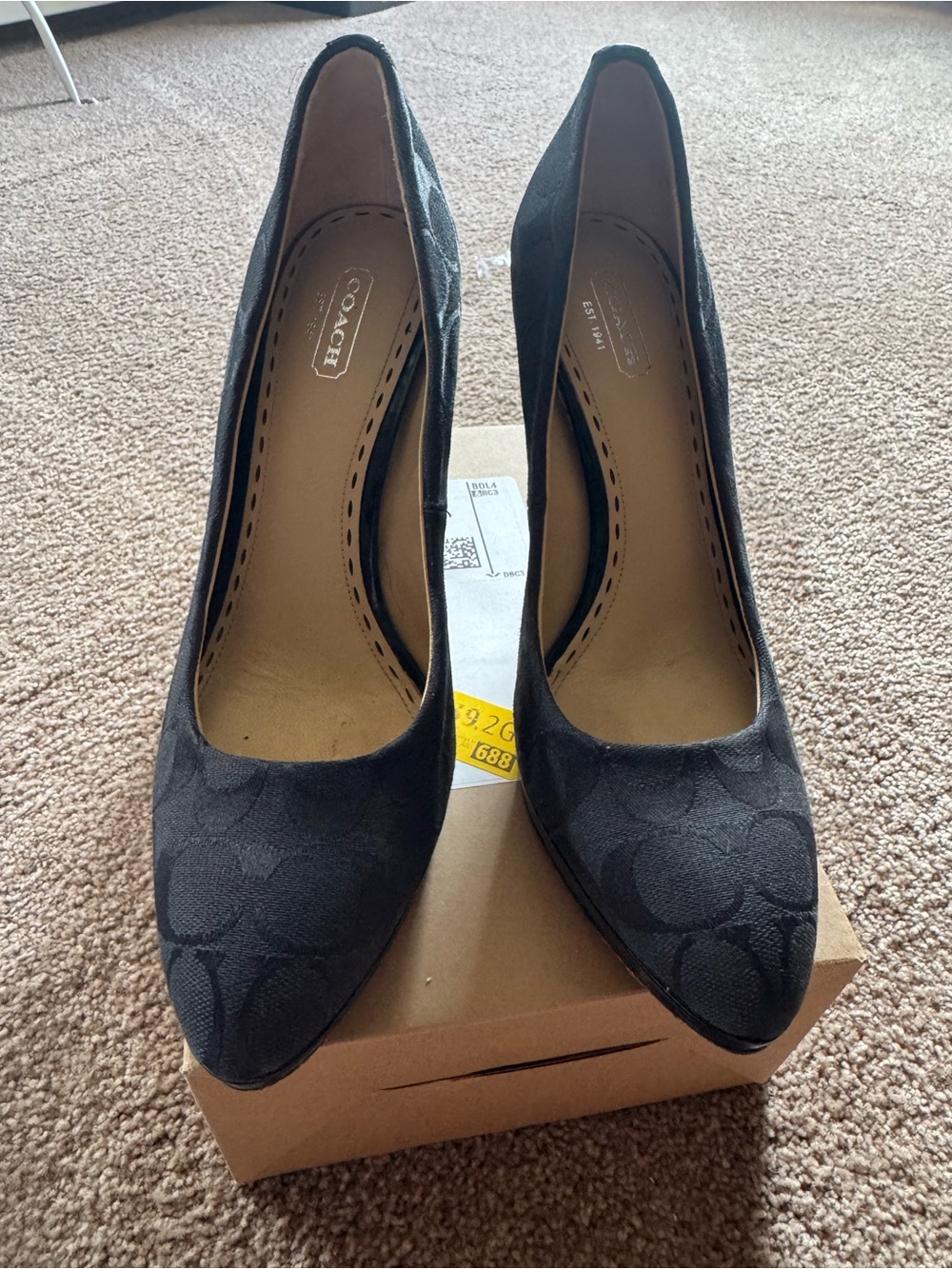 Coach Black Signature Canvas Pointed Toe Pumps, with Pattern leather detailing.